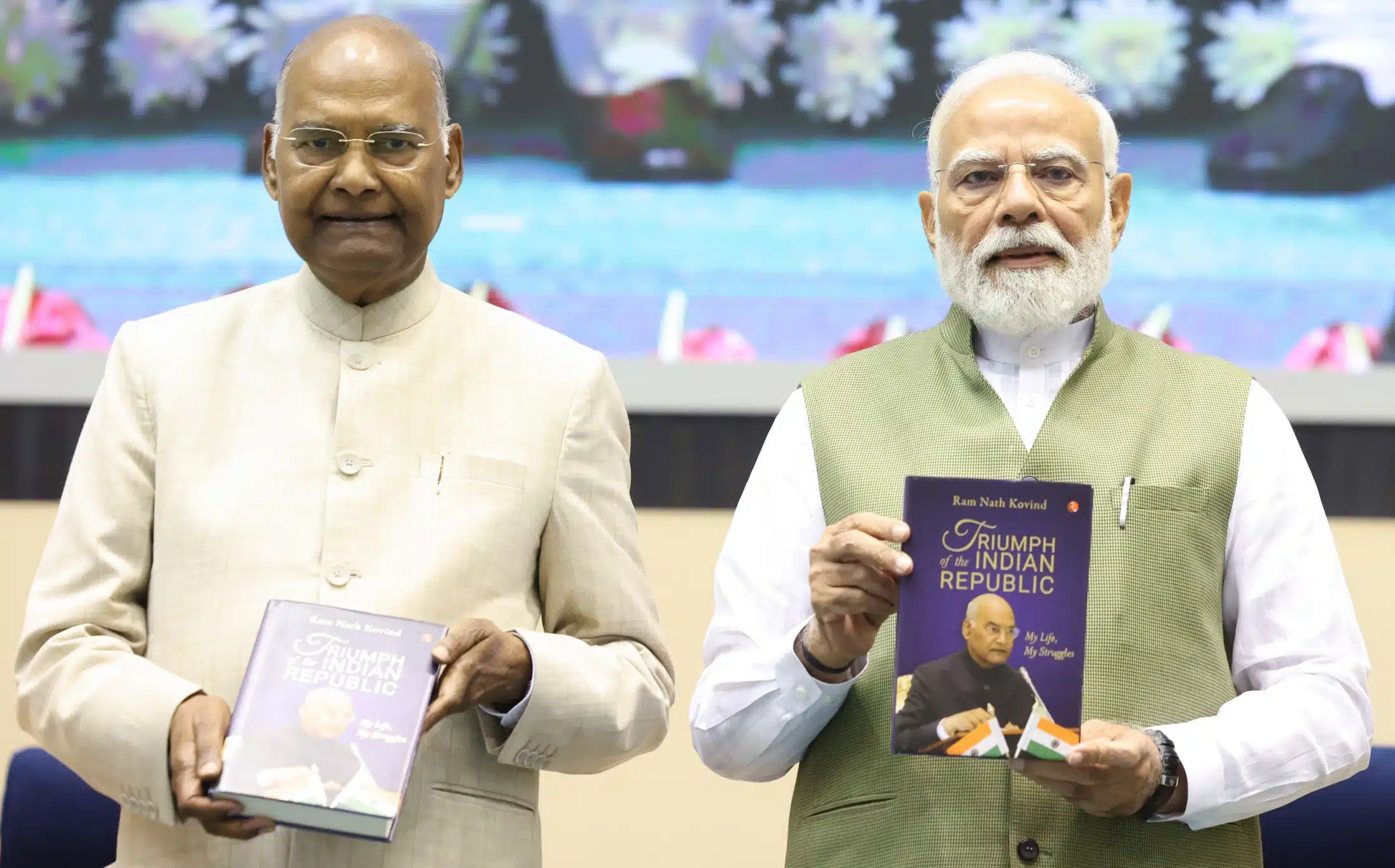 Ram Nath Kovind and PM Modi with 'Triumph of the Indian Republic: My Life, My Struggles'.